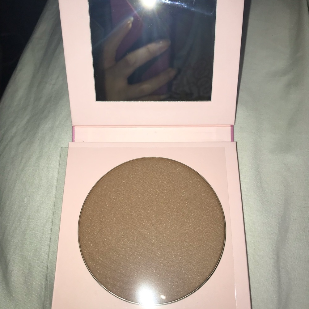 Waterproof face and body bronzer